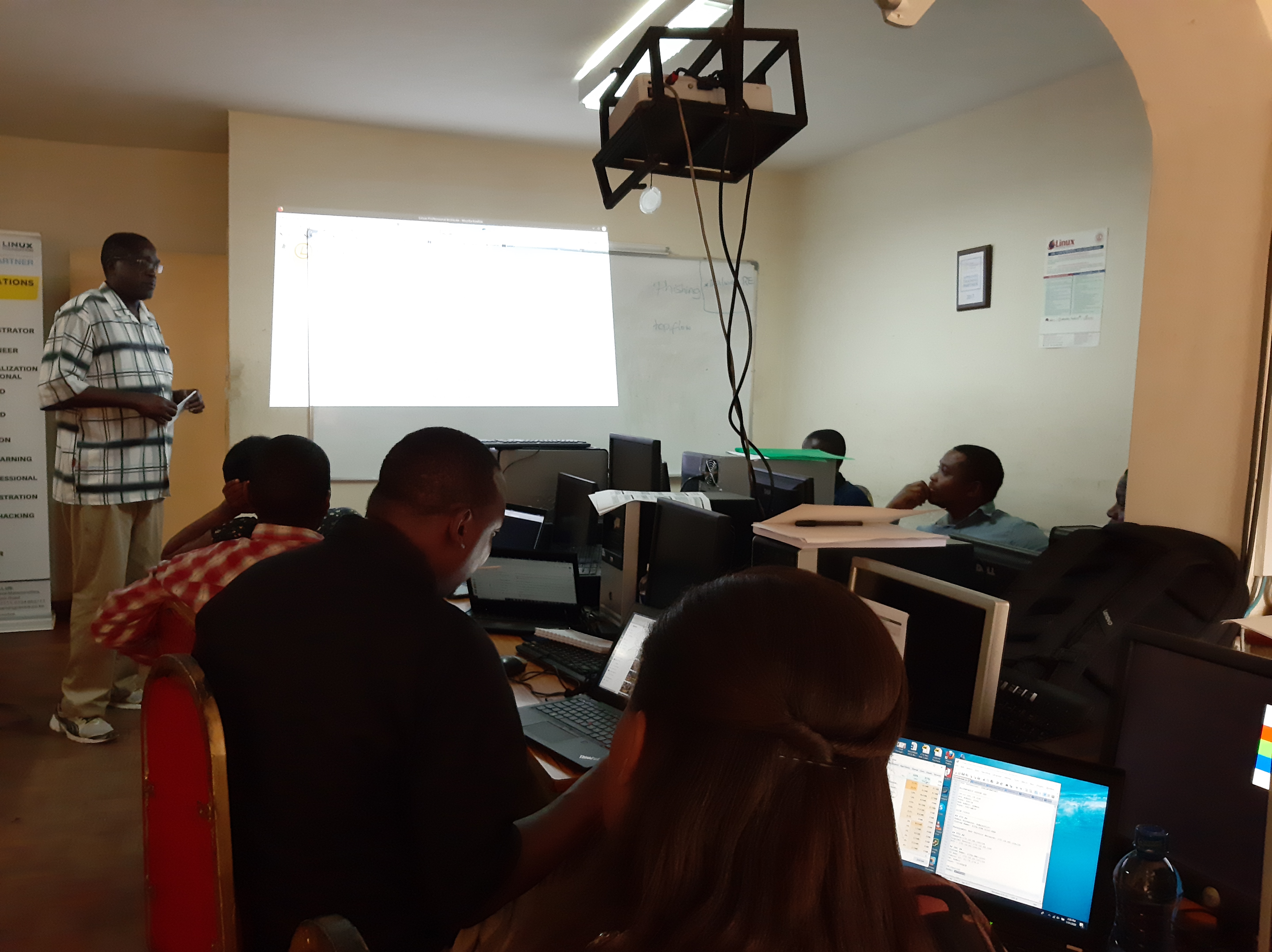 Mr. Morris Ouma, LPI Certified Engineer cum Instructor conducting GNU/LINUX and UNIX Commands Training Session to ICT Officers from GoK at Linux Learning Centre Ltd.