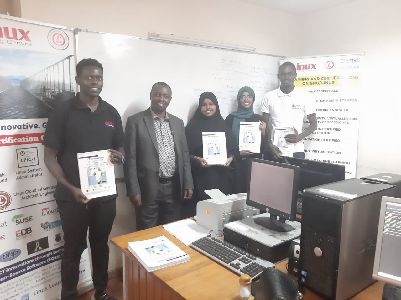Director Linux Learning Centre Mr. Anthony Gatimu issuing LPI Linux Certificates to Participants - February 2022