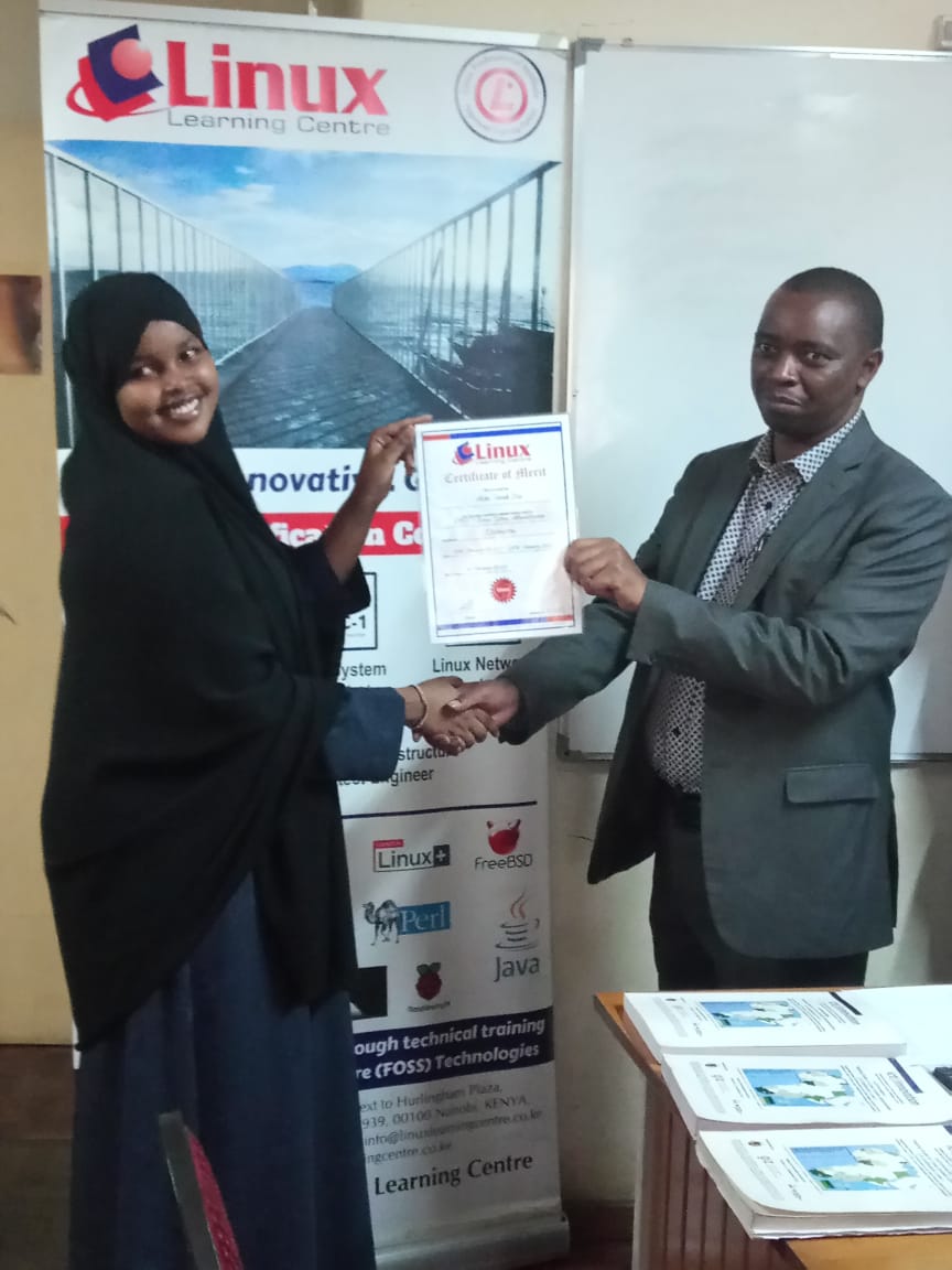 Director Linux Learning Centre Ltd Mr. Anthony Gatimu issuing LPI Linux Certificates to Participants - February 2022