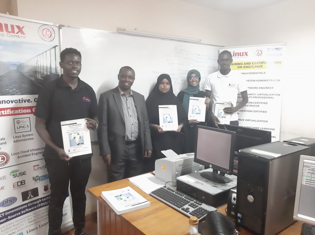 Director Linux Learning Centre Ltd Mr. Anthony Gatimu issuing LPI Linux Certificates to Participants - February 2022
